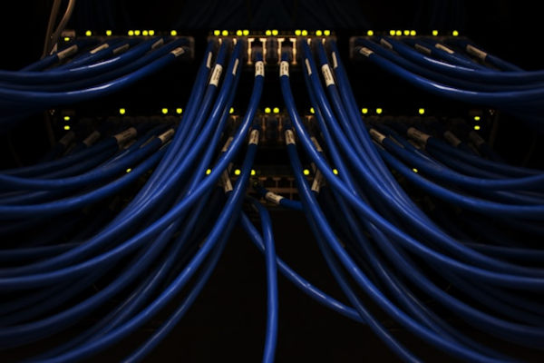 Network switches with cables plugged in